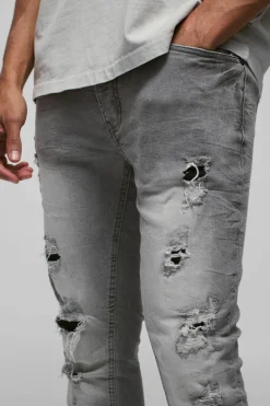 New boohooMAN Skinny Stretch Ripped Jeans In ice grey