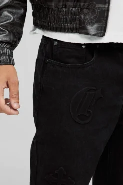 Store boohooMAN Slim Fit Cross Embossed Jeans washed black