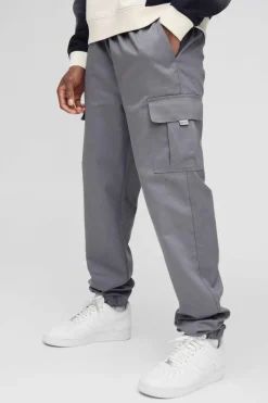 Best Sale boohooMAN Slim Fit Elasticated Waist Woven Tab Cuffed Cargo Trousers charcoal