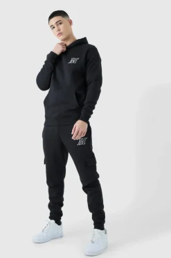 Shop boohooMAN Slim Fit Embroidered Cargo Tracksuit black