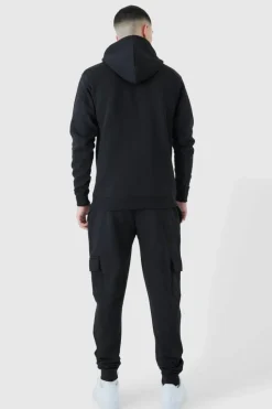 Shop boohooMAN Slim Fit Embroidered Cargo Tracksuit black