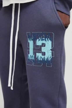 Cheap boohooMAN Slim Fit Graffiti 13 Varsity Gusset Jogger purple
