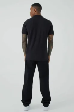 Shop boohooMAN Slim Fit Heart Short Sleeve Pique Polo black