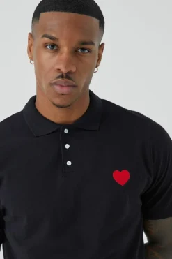 Shop boohooMAN Slim Fit Heart Short Sleeve Pique Polo black