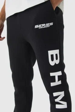 Shop boohooMAN Slim Fit Moto Series Flared Stacked Gusset Jogger black