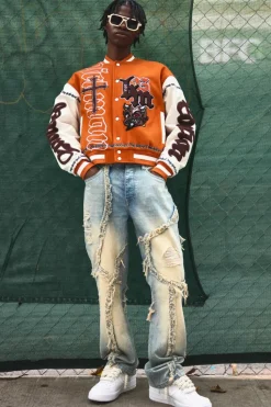 Online boohooMAN Slim Flared Patchwork Distressed Bleached Jeans light blue