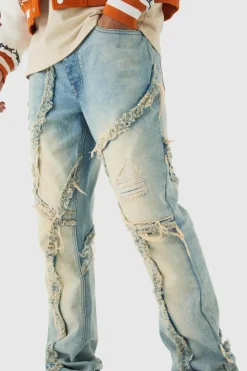 Online boohooMAN Slim Flared Patchwork Distressed Bleached Jeans light blue
