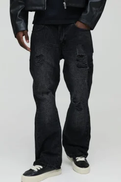 Store boohooMAN Slim Flared Ripped Washed Jeans charcoal