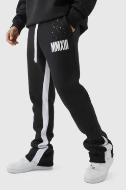 Sale boohooMAN Slim Flared Stacked Fit Man Paint Splatter Flared Joggers black
