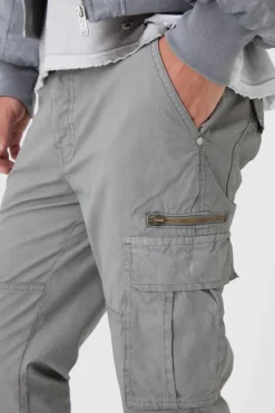 Online boohooMAN Slim Flare Zip Gusset Overdye Acid Wash Cargo Trousers slate