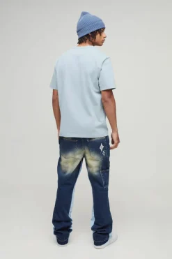 Store boohooMAN Slim Rigid Flared Carpenter Varsity Badge Gusset Jeans vintage wash