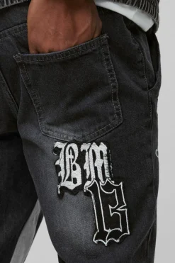 Flash Sale boohooMAN Slim Rigid Flared Ripped Varsity Badge Gusset Jeans washed black