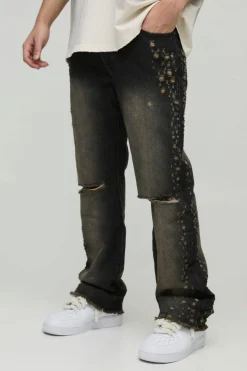 Shop boohooMAN Slim Rigid Flared Stacked Distressed Washed Jeans brown