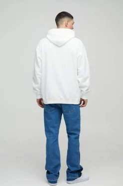 Flash Sale boohooMAN Slim Rigid Flare Embroidery Paint Splatter Gusset Denim Jeans light blue