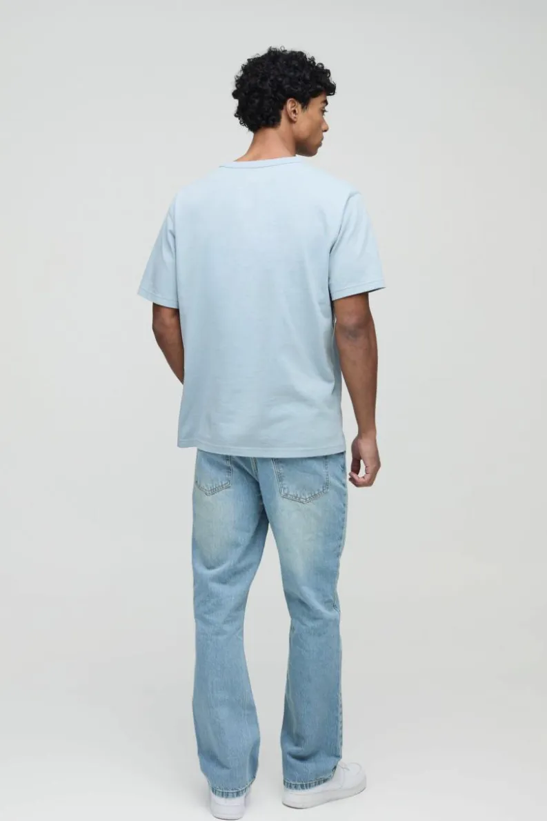 Shop boohooMAN Slim Rigid Flare Jean In antique blue