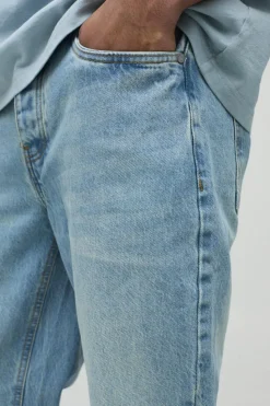 Shop boohooMAN Slim Rigid Flare Jean In antique blue
