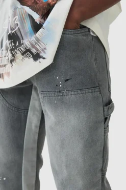 Shop boohooMAN Slim Rigid Flare Paint Splatter Gusset Carpenter Jeans grey