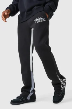 Shop boohooMAN Slim Stacked Flare Star Print Gusset Jogger black
