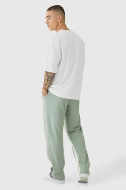 Shop boohooMAN Straight Leg Contrast Stitch Loopback Gusset Jogger khaki