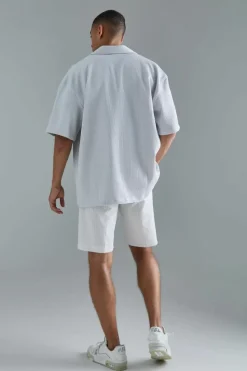Shop boohooMAN Stripe Seersucker Fixed Waist Regular Fit Shorts ecru