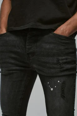 Hot boohooMAN Super Skinny Distressed Paint Splat Jeans washed black