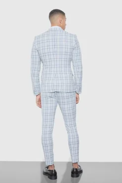 Shop boohooMAN Super Skinny Check Suit Trousers grey