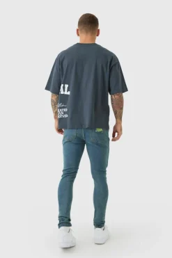 Store boohooMAN Super Skinny Stretch Carpenter Rip & Repair Denim Jeans petrol