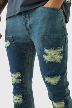 Store boohooMAN Super Skinny Stretch Carpenter Rip & Repair Denim Jeans petrol