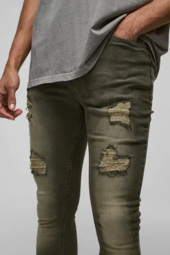Shop boohooMAN Super Skinny Stretch Ripped Jean grey