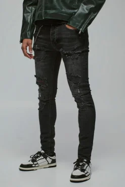 Online boohooMAN Super Skinny Stretch Rip & Repair Denim Jeans true black