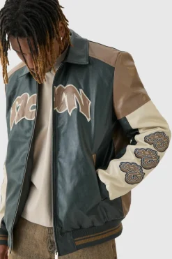 Shop boohooMAN Tall Badge Detail Colour Block PU Varsity Jacket In black