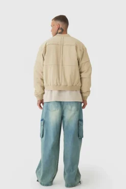 Online boohooMAN Tall Boxy Panel Padded Nylon Bomber Jacket In stone