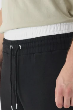 New boohooMAN Tall Double Waistband Baggy Fit Jersey Bottoms In black