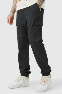 Store boohooMAN Tall Elasticated Waist Twill Slim Fit Cargo Trouser black