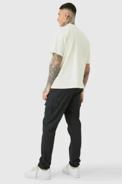 Store boohooMAN Tall Elasticated Waist Twill Slim Fit Cargo Trouser black
