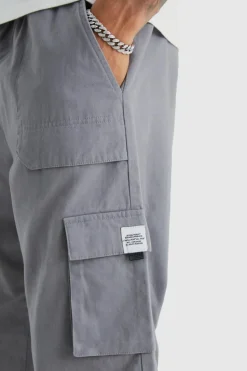 New boohooMAN Tall Elastic Waist Relaxed Fit Buckle Cargo Jogger slate