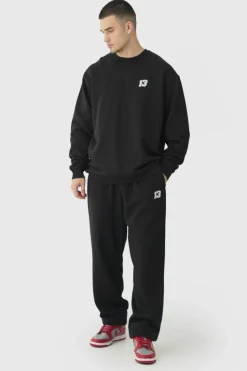 Shop boohooMAN Tall 13 Embroidered Sweat Tracksuit black