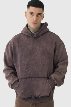 Shop boohooMAN Tall Oversized Boxy Acid Wash Hoodie chocolate