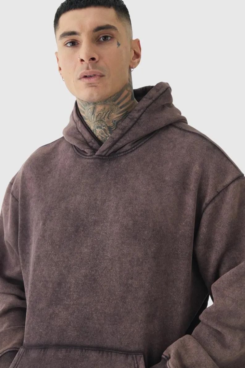Shop boohooMAN Tall Oversized Boxy Acid Wash Hoodie chocolate