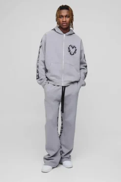 Shop boohooMAN Tall Oversized Boxy Gothic Heart Print Gusset Hooded Tracksuit grey marl