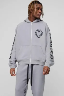 Shop boohooMAN Tall Oversized Boxy Gothic Heart Print Gusset Hooded Tracksuit grey marl