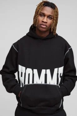 Shop boohooMAN Tall Oversized Boxy Twill Applique Contrast Stitch Hoodie black