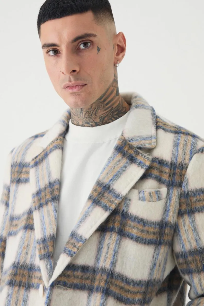 Store boohooMAN Tall Oversized Brushed Check Overcoat In ecru
