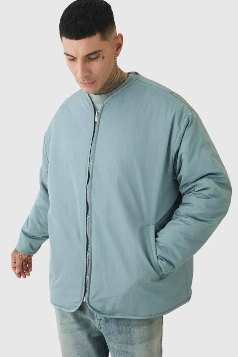 Store boohooMAN Tall Oversized Collarless Padded Bomber Jacket In slate