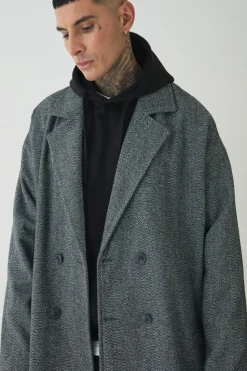 Store boohooMAN Tall Oversized Drop Shoulder Herringbone Overcoat In grey