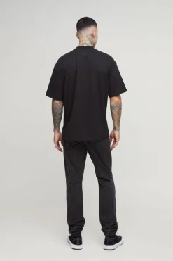 Shop boohooMAN Tall Oversized Extended Neck Basic T-Shirt black
