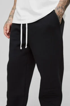 Discount boohooMAN Tall Oversized MMXIII Embossed Jogger black