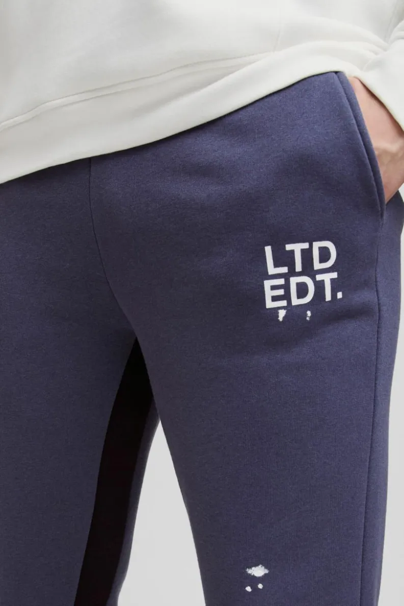 Fashion boohooMAN Tall Regular Fit Ltd Edt Paint Splatter Gusset Jogger purple