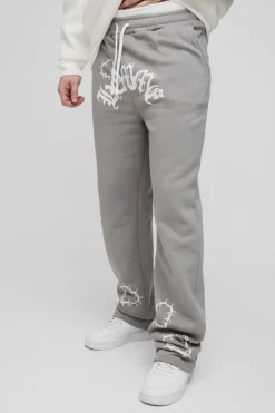Shop boohooMAN Tall Relaxed Double Waistband Heart Print Jogger charcoal