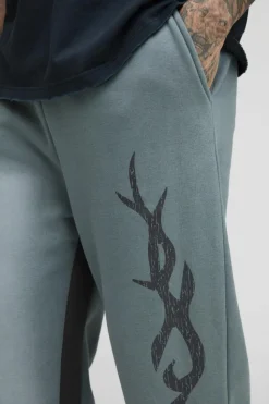Best boohooMAN Tall Relaxed Fit Flare Spray Wash Graphic Jogger slate